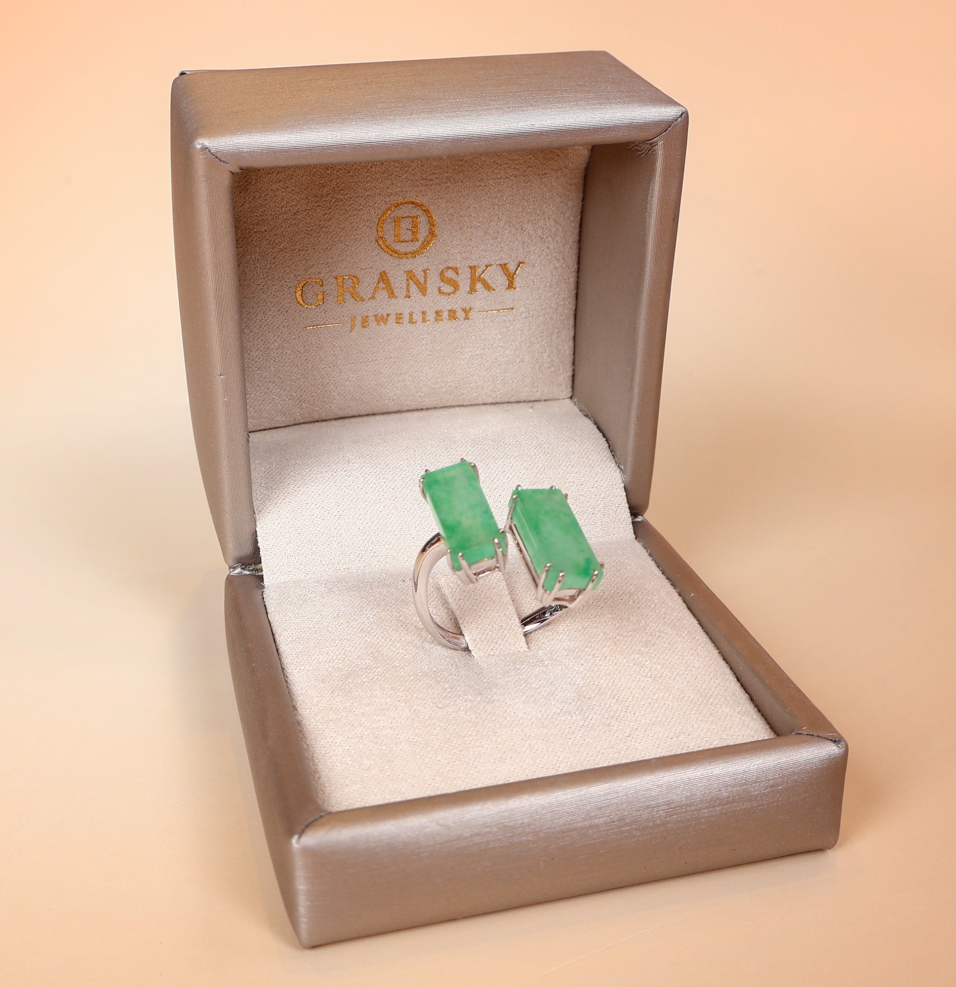 Semi-open jade ring with two jade stones of packaging box
