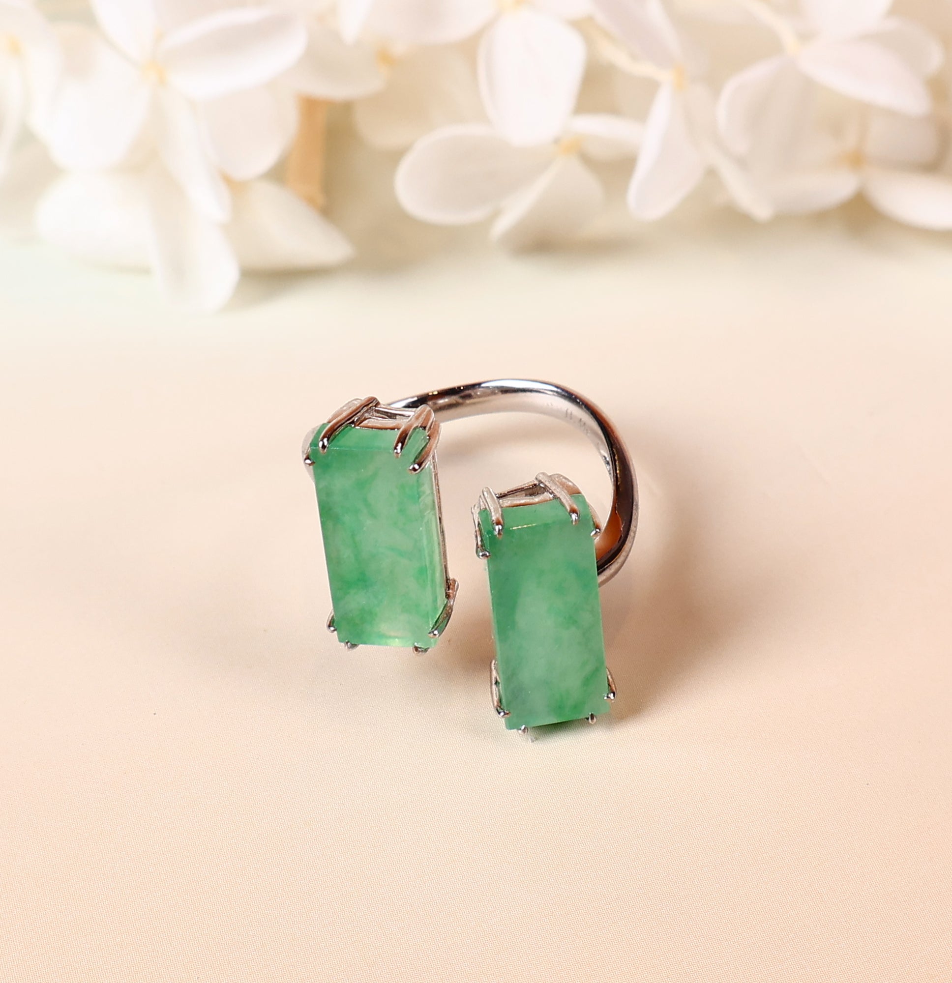 Semi-open jade ring with two jade stones