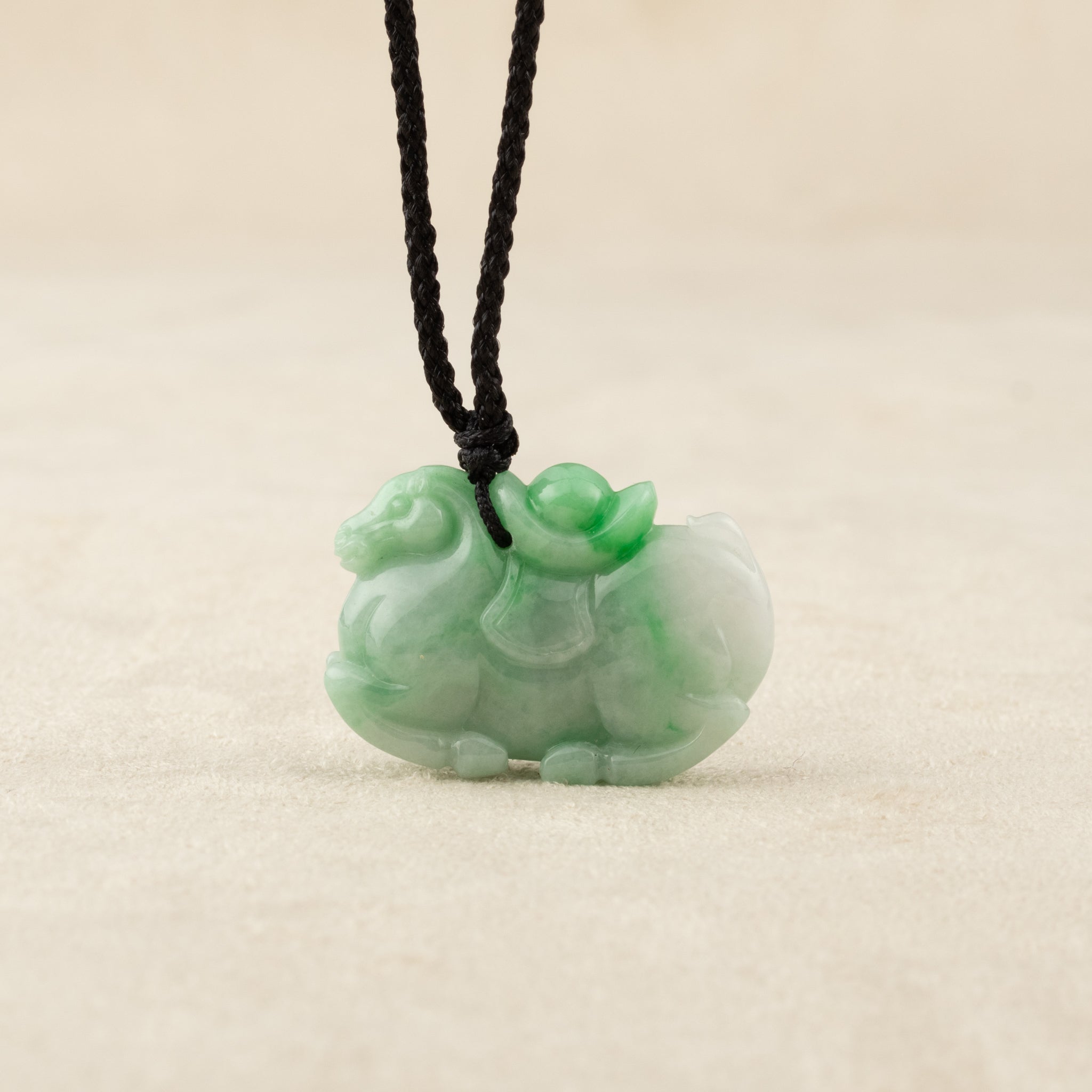 What Does a Green Jade Horse Pendant Symbolize?