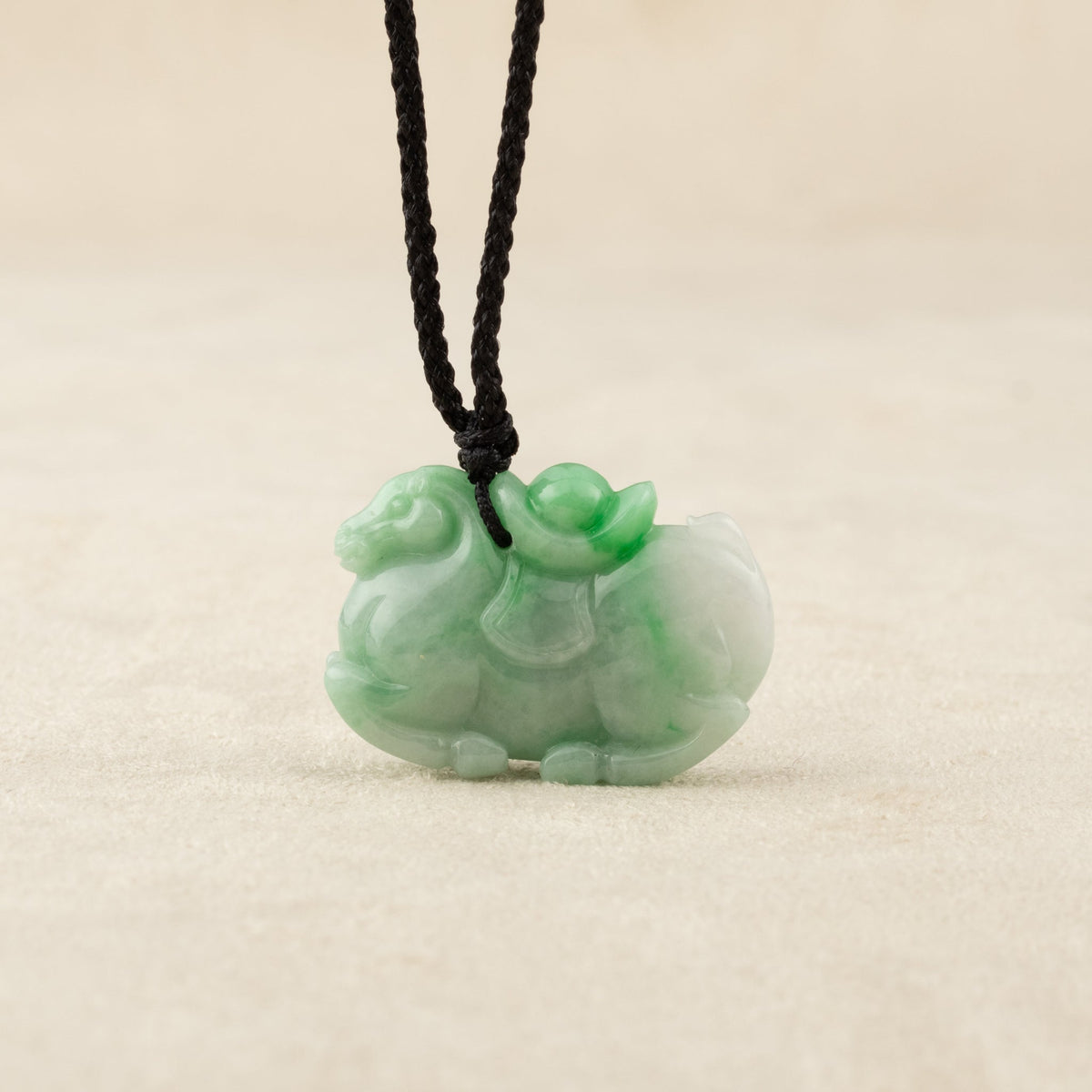 What Does a Green Jade Horse Pendant Symbolize?